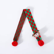 Knitted wool Christmas scarf for pets with red and green plaid pattern and pom-poms, featuring a snowman decoration